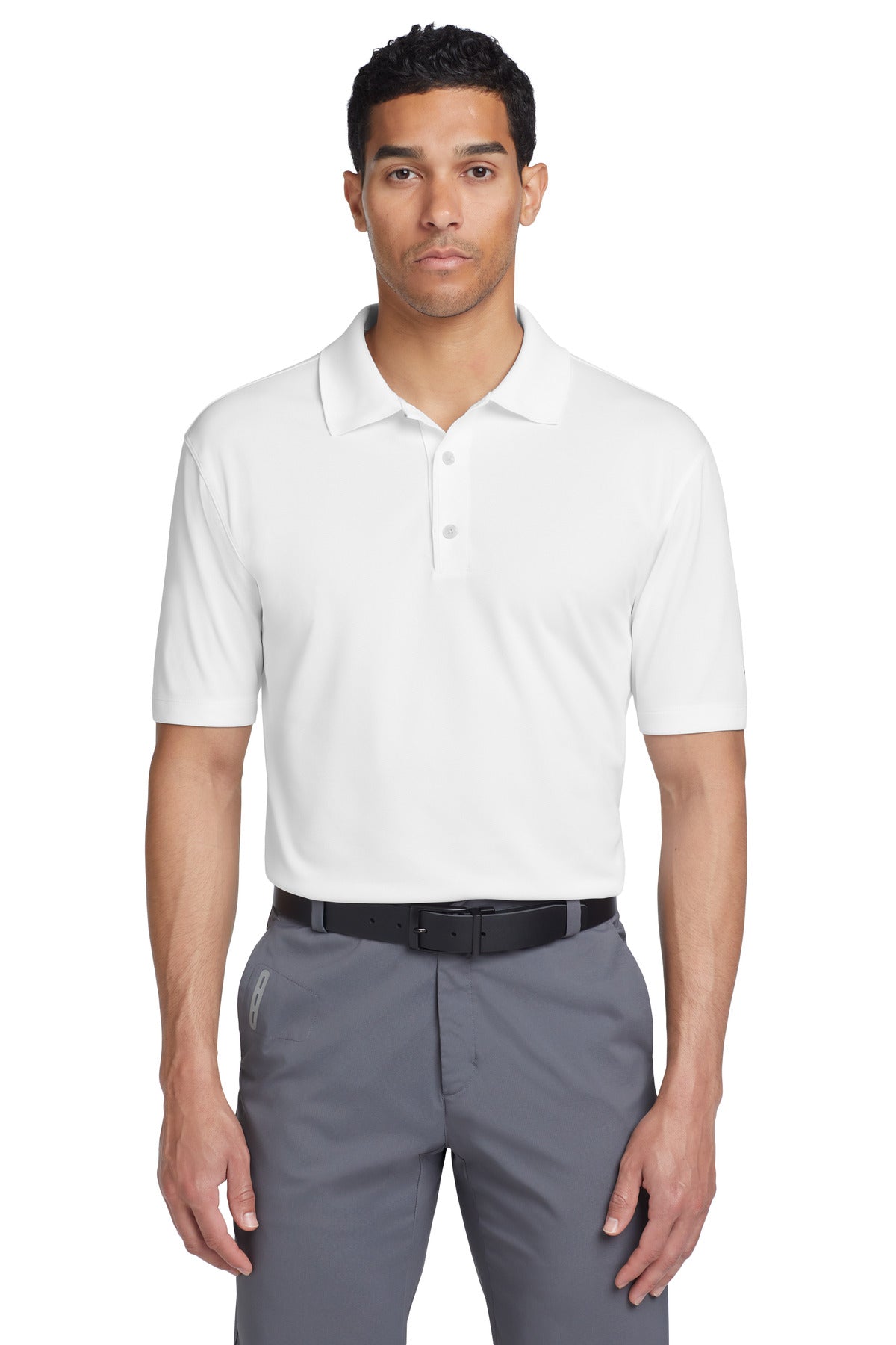 White Nike Tech Basic Dri-FIT Polo shirt worn by a model, front view showcasing the athletic fit and breathable fabric.