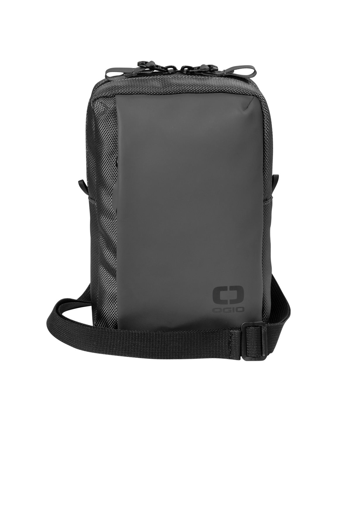 OGIO resistant crossbody bag in tarmac grey with flat front design, durable and compact for everyday use.