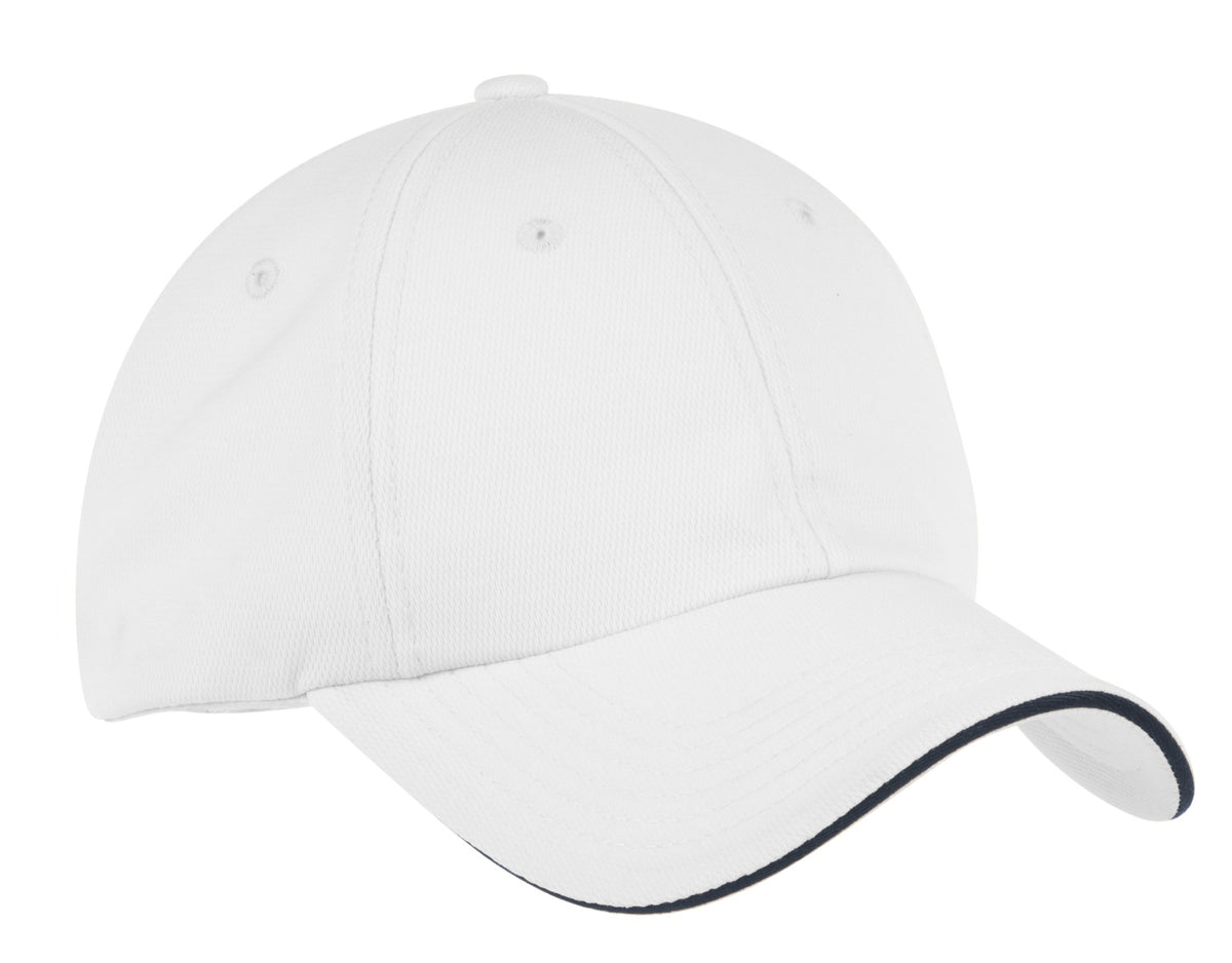 White and navy Port Authority Dry Zone cap with front logo, adjustable strap, and breathable fabric for outdoor wear.