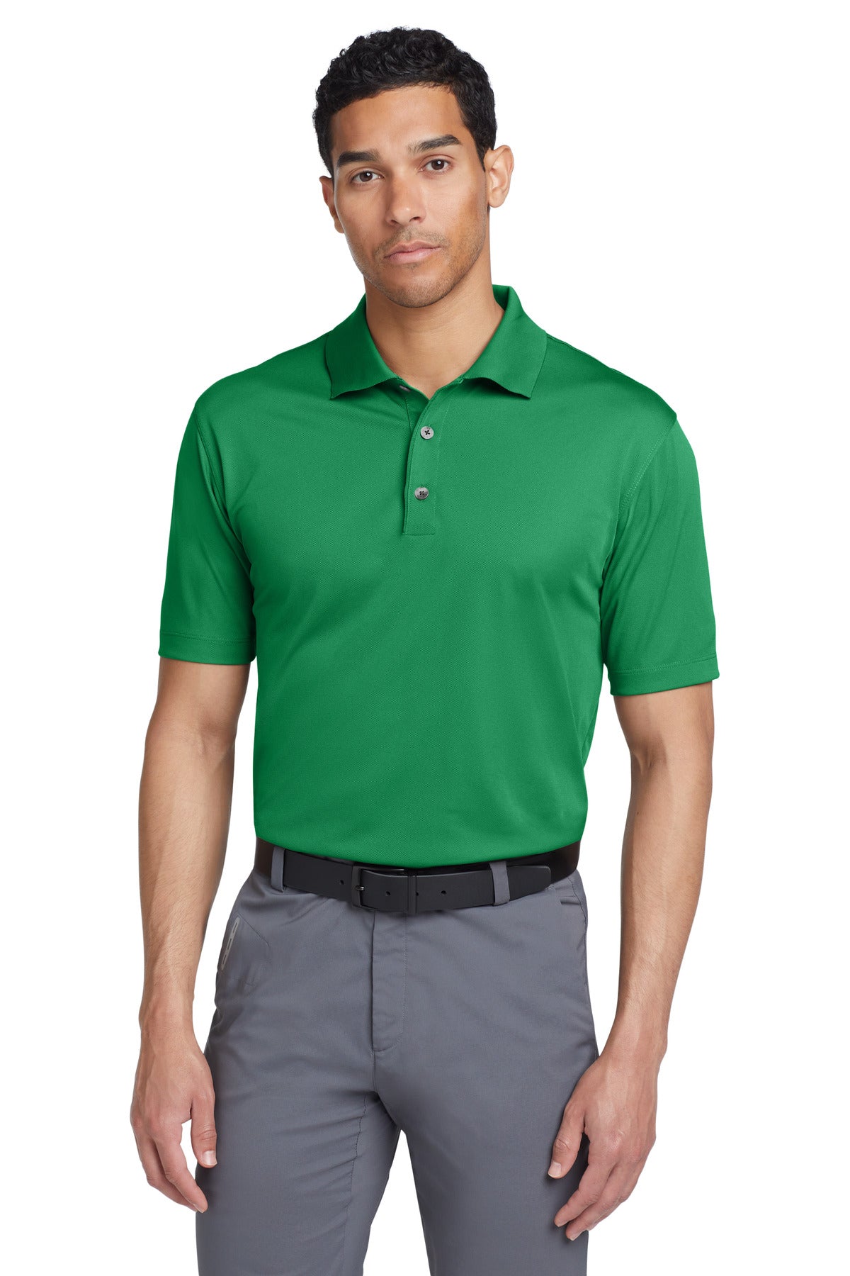 Nike Tech Basic Dri-FIT Polo in Lucky Green, front view showing lightweight athletic shirt with collar and short sleeves.