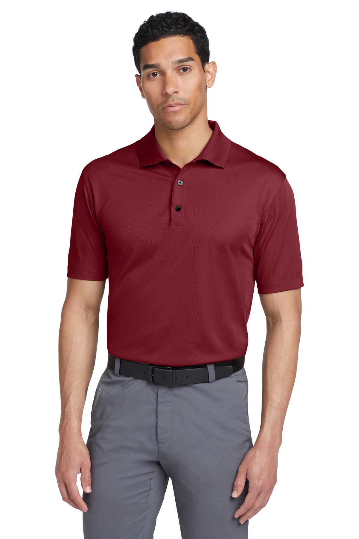 Nike Tech Basic Dri-FIT Polo in team red, front view showing lightweight fabric and classic polo collar.