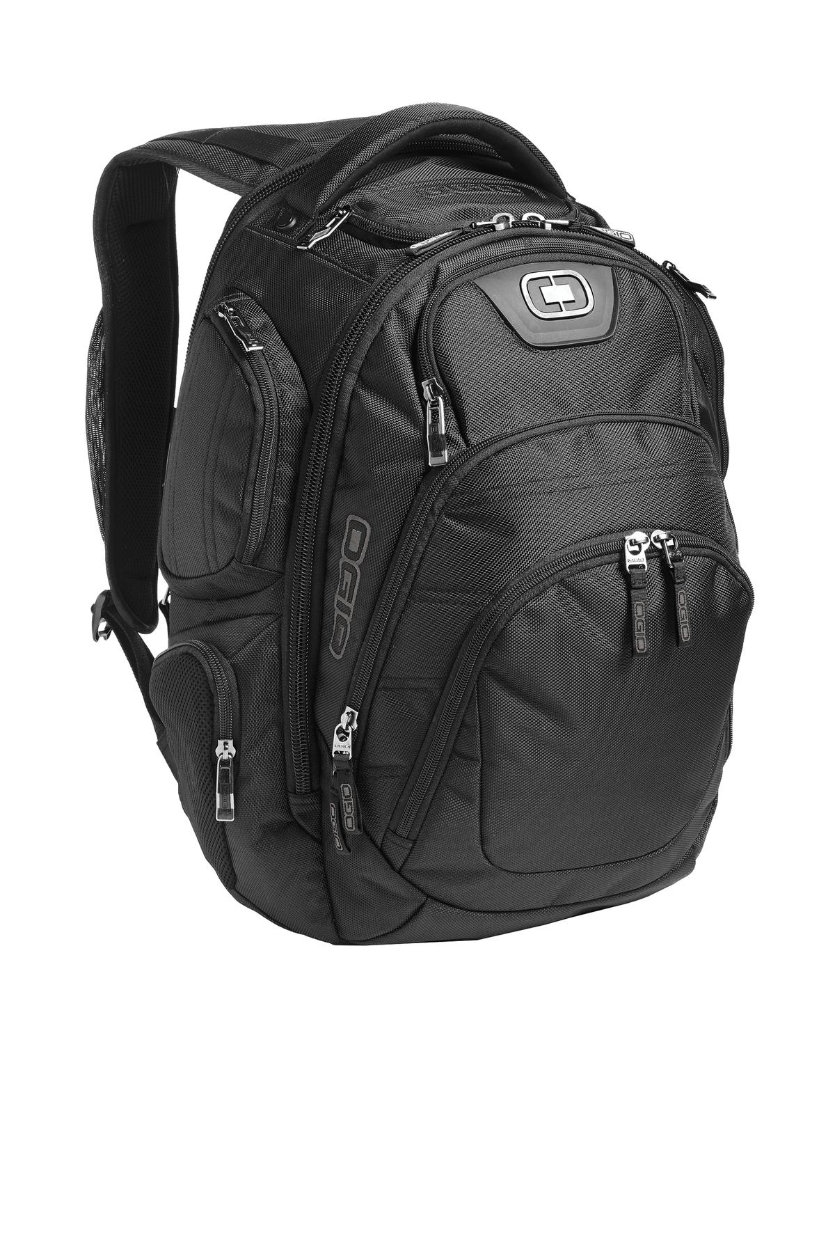 Black OGIO Stratagem Pack with flat front design, featuring multiple compartments and padded shoulder straps for comfortable carrying.
