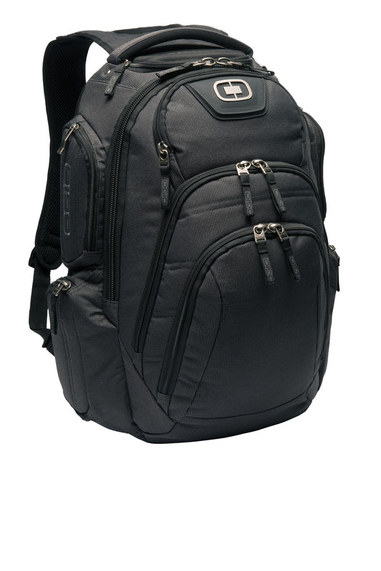 Black OGIO Surge RSS Pack with pin-dot design, front view showing multiple compartments and adjustable straps.