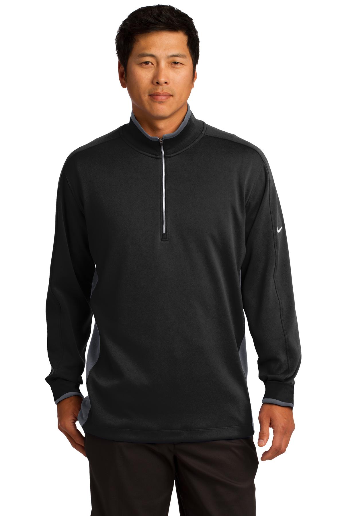 Nike Dri-FIT 1/2-Zip Cover-Up in black, deep gray, and white, front view showcasing lightweight athletic fabric and zip collar.