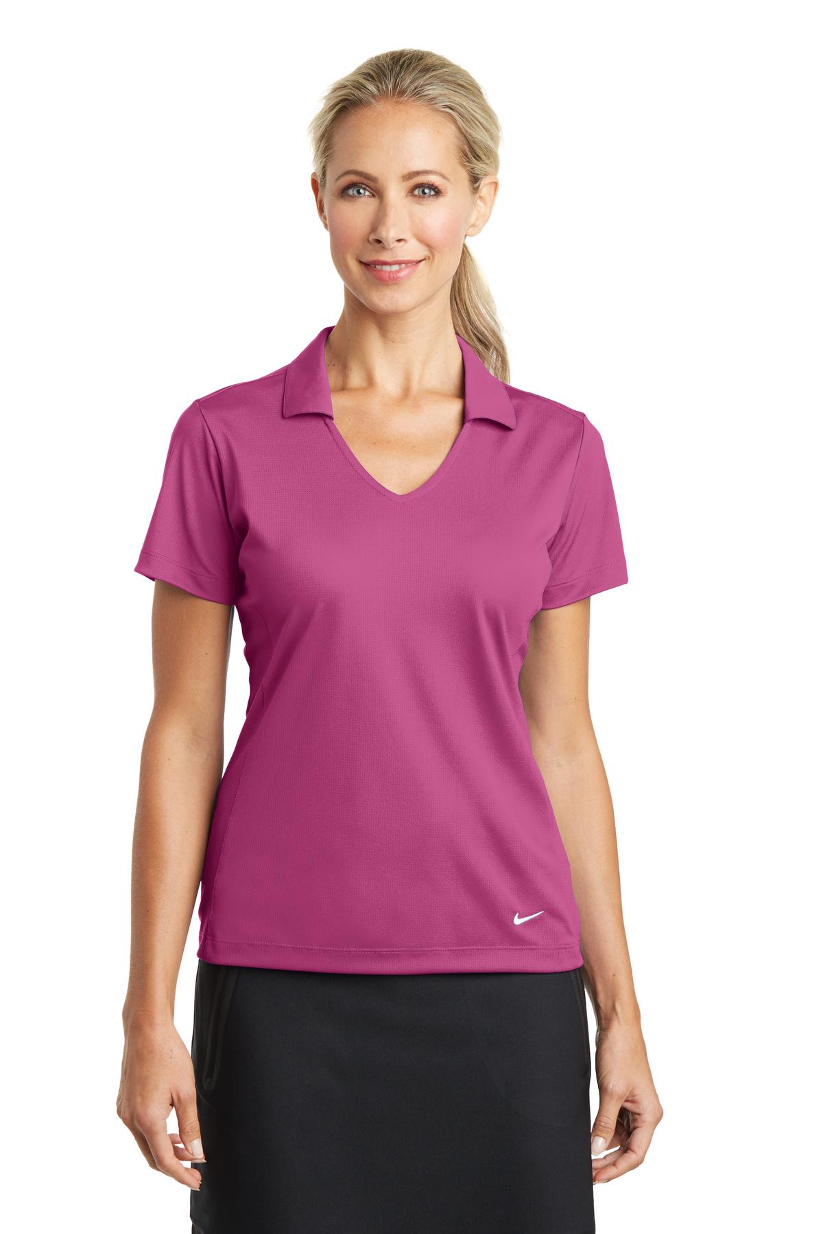 Nike Women's Dri-FIT Vertical Mesh Polo in pink fire, front view showing breathable mesh fabric and classic polo design.