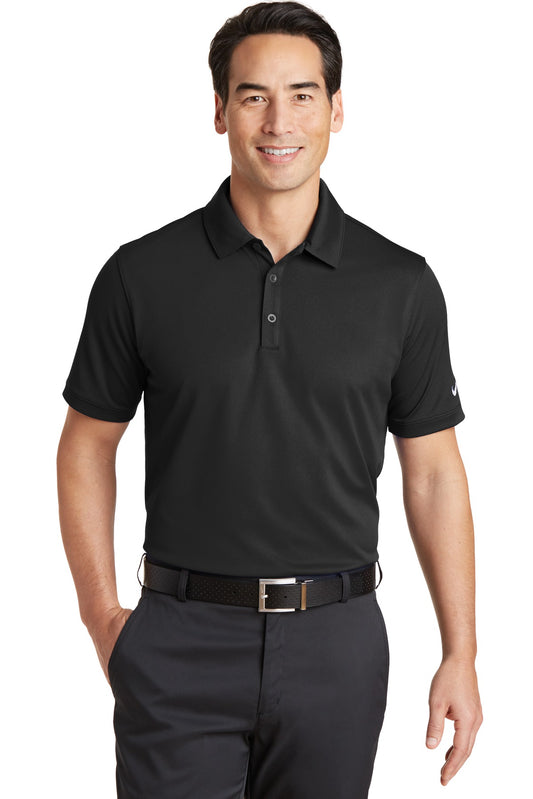 Black Nike Dri-FIT Solid Icon Pique Modern Fit Polo shirt worn by a model, front view, showcasing the classic collar and Nike logo.