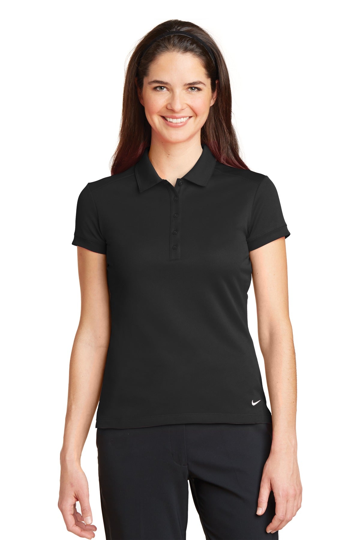Black Nike Women's Dri-FIT Solid Icon Pique Modern Fit Polo shirt, front view on model, showcasing the athletic fit and polo collar.