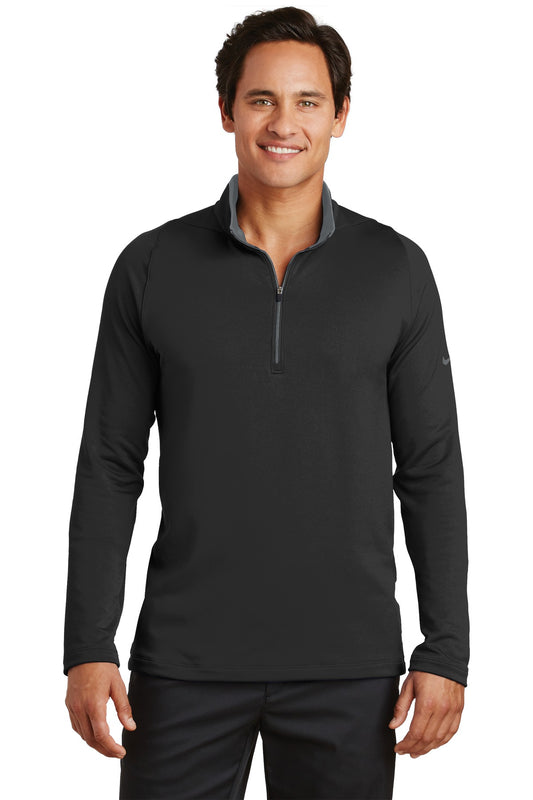 Nike Dri-FIT Stretch 1/2-Zip Cover-Up in black and dark grey, front view showing lightweight, breathable athletic fabric.