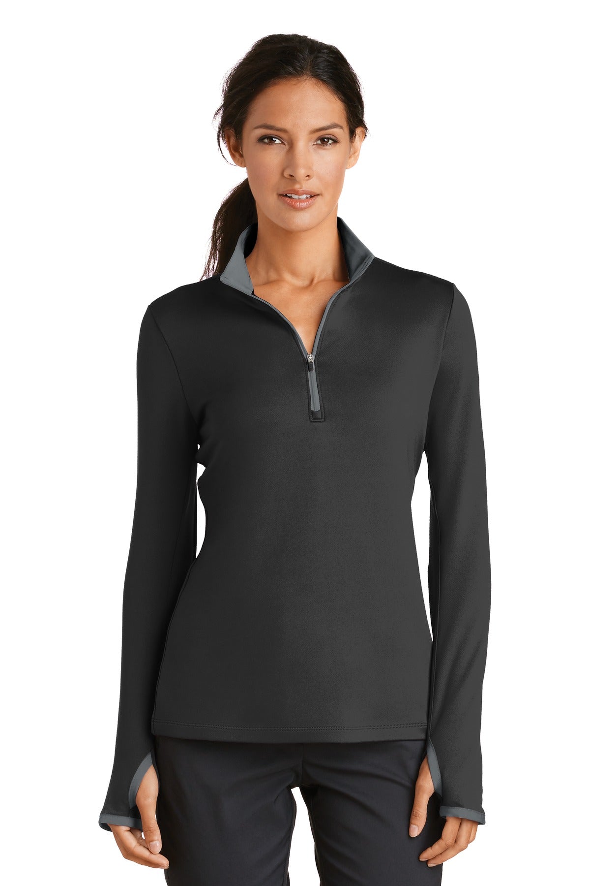 Nike Women's Dri-FIT Stretch 1/2-Zip Cover-Up in black and dark grey, front view on a model, moisture-wicking athletic apparel