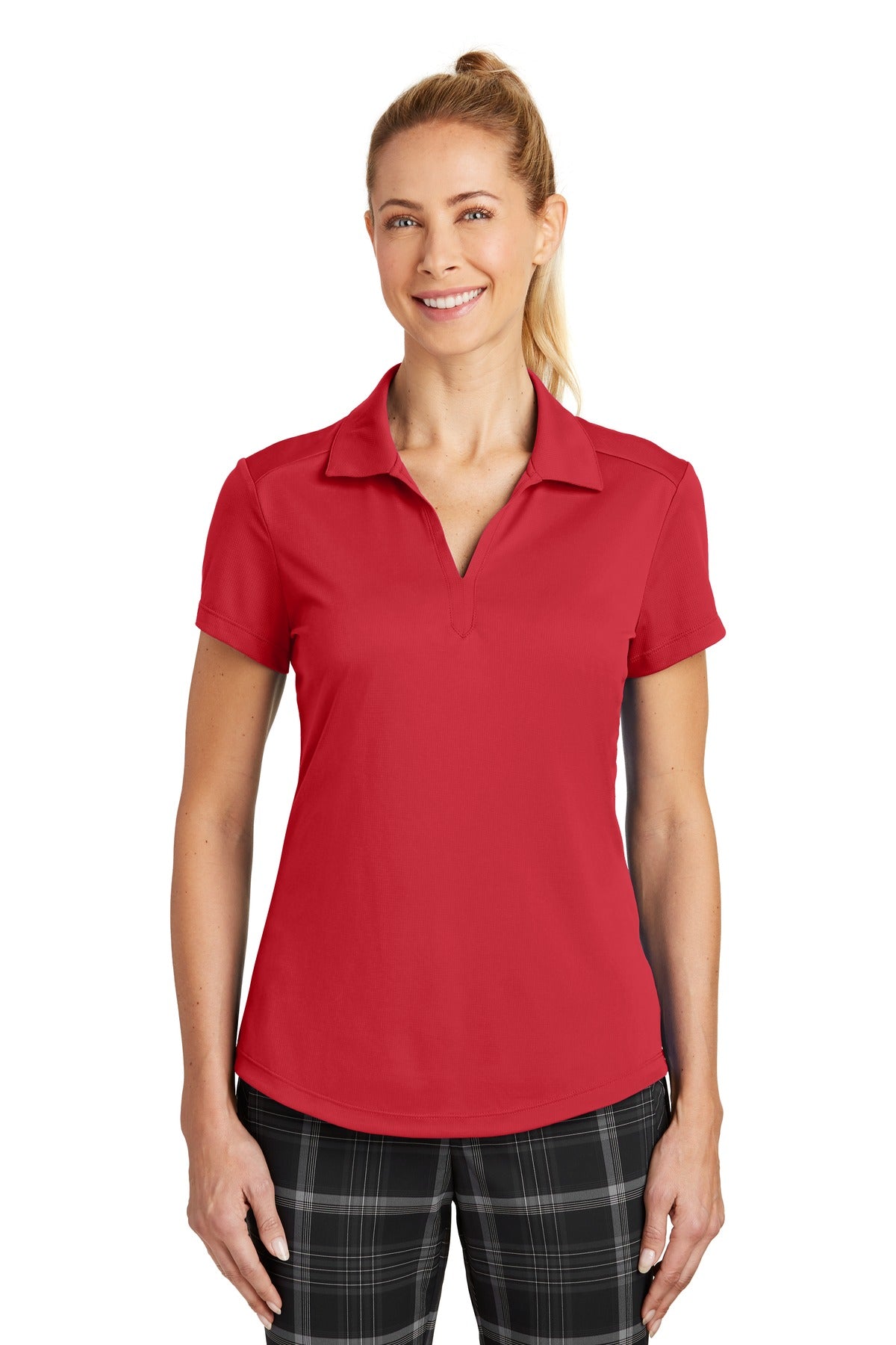 Nike Women's Dri-FIT Legacy Polo in red, front view showing breathable fabric and classic polo collar.