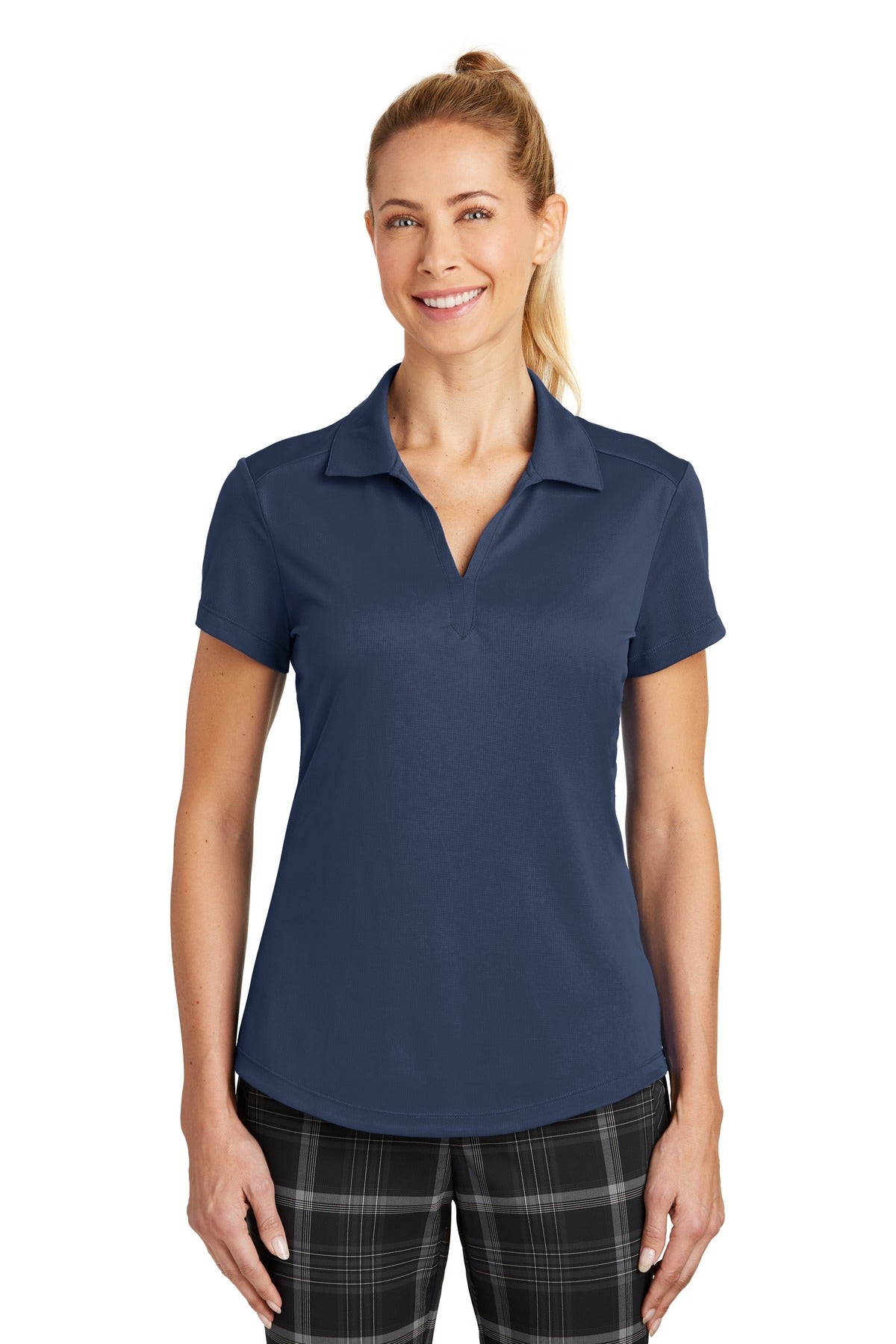 Nike Women's Dri-FIT Legacy Polo in midnight navy, front view showing breathable fabric and classic polo design.