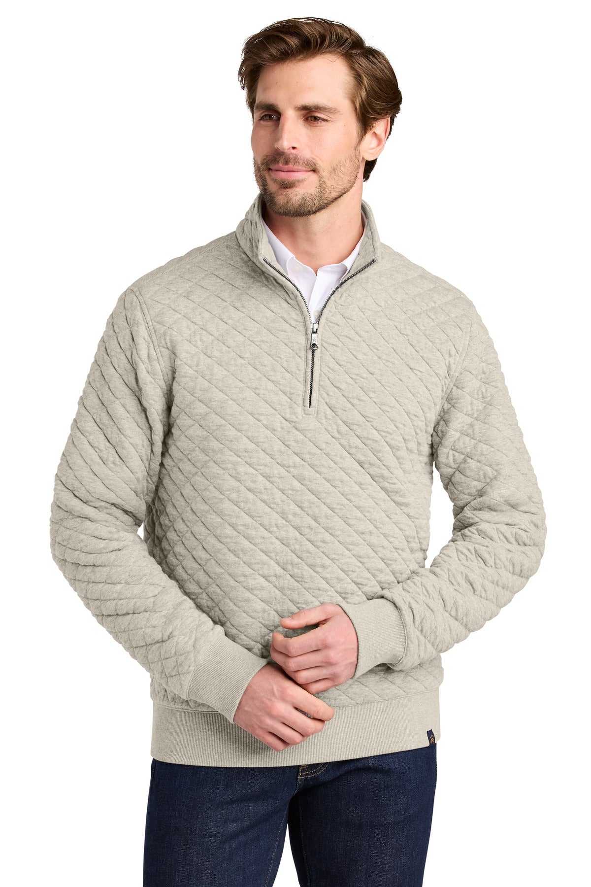 Brooks Brothers diamond quilt oatmeal heather 1/4-zip sweater worn by a model, front view showing textured knit and zipper detail.