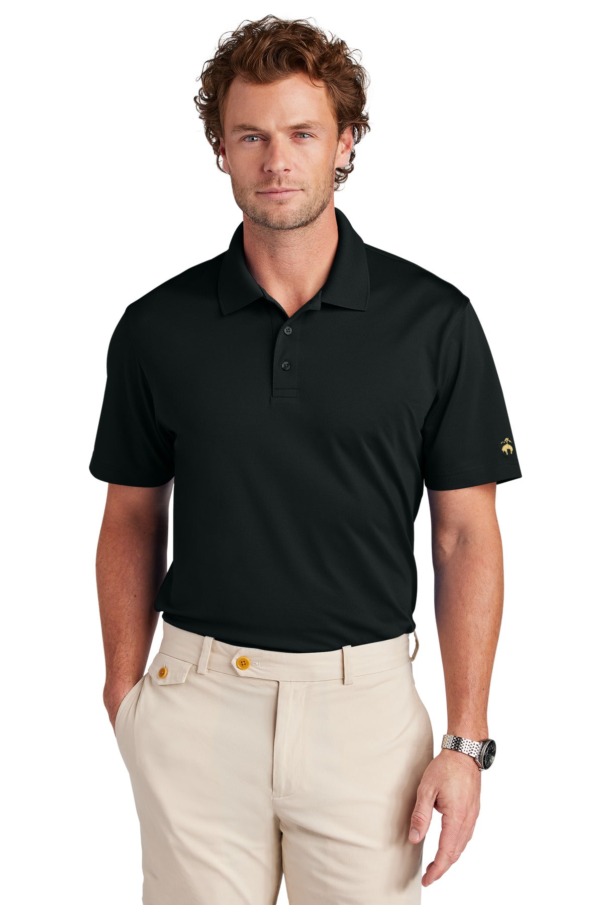 Brooks Brothers mesh pique performance polo in deep black worn by a model, front view showing classic collar and short sleeves.