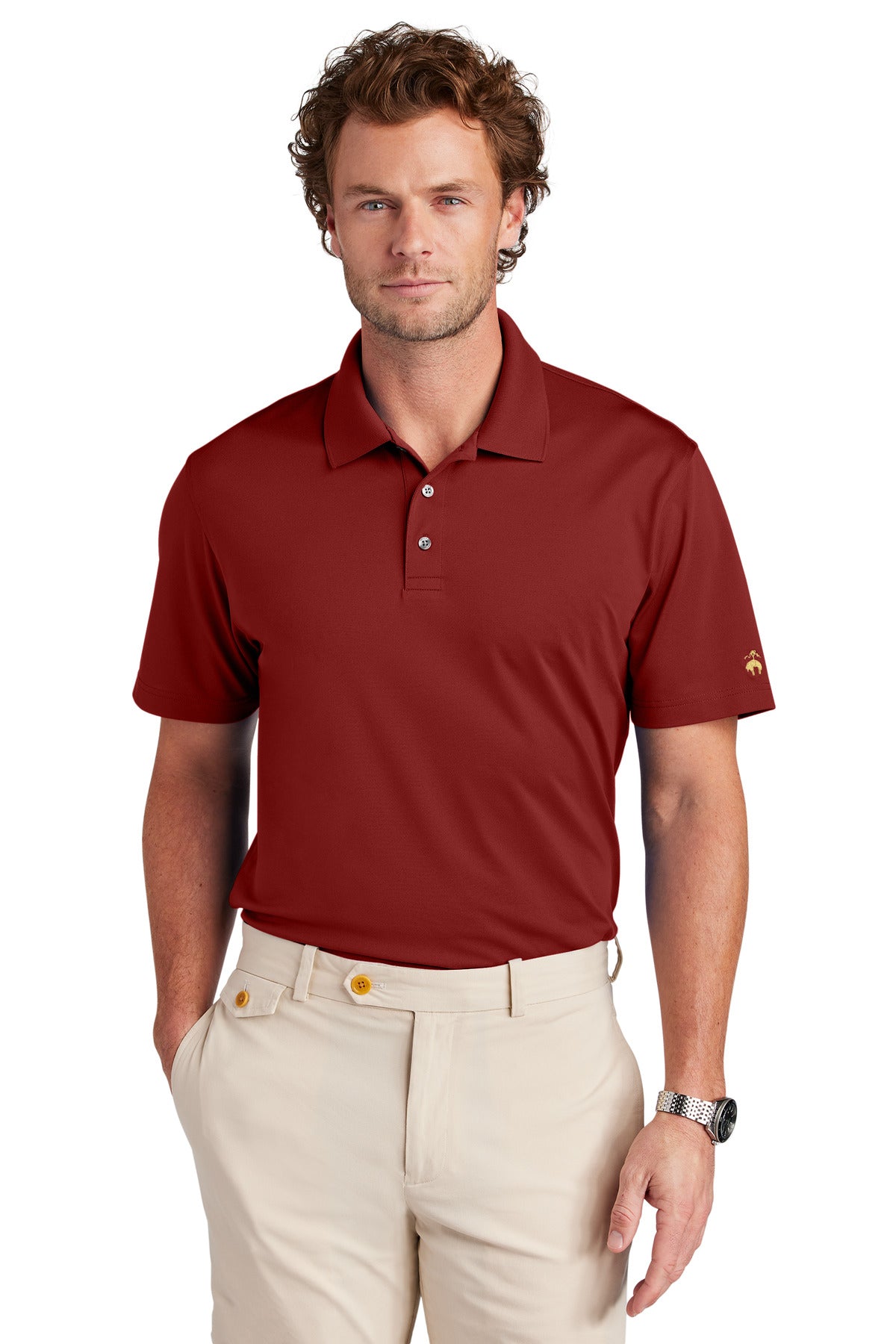 Brooks Brothers mesh pique performance polo shirt in rich red, worn by a male model, front view showing collar and polo design.