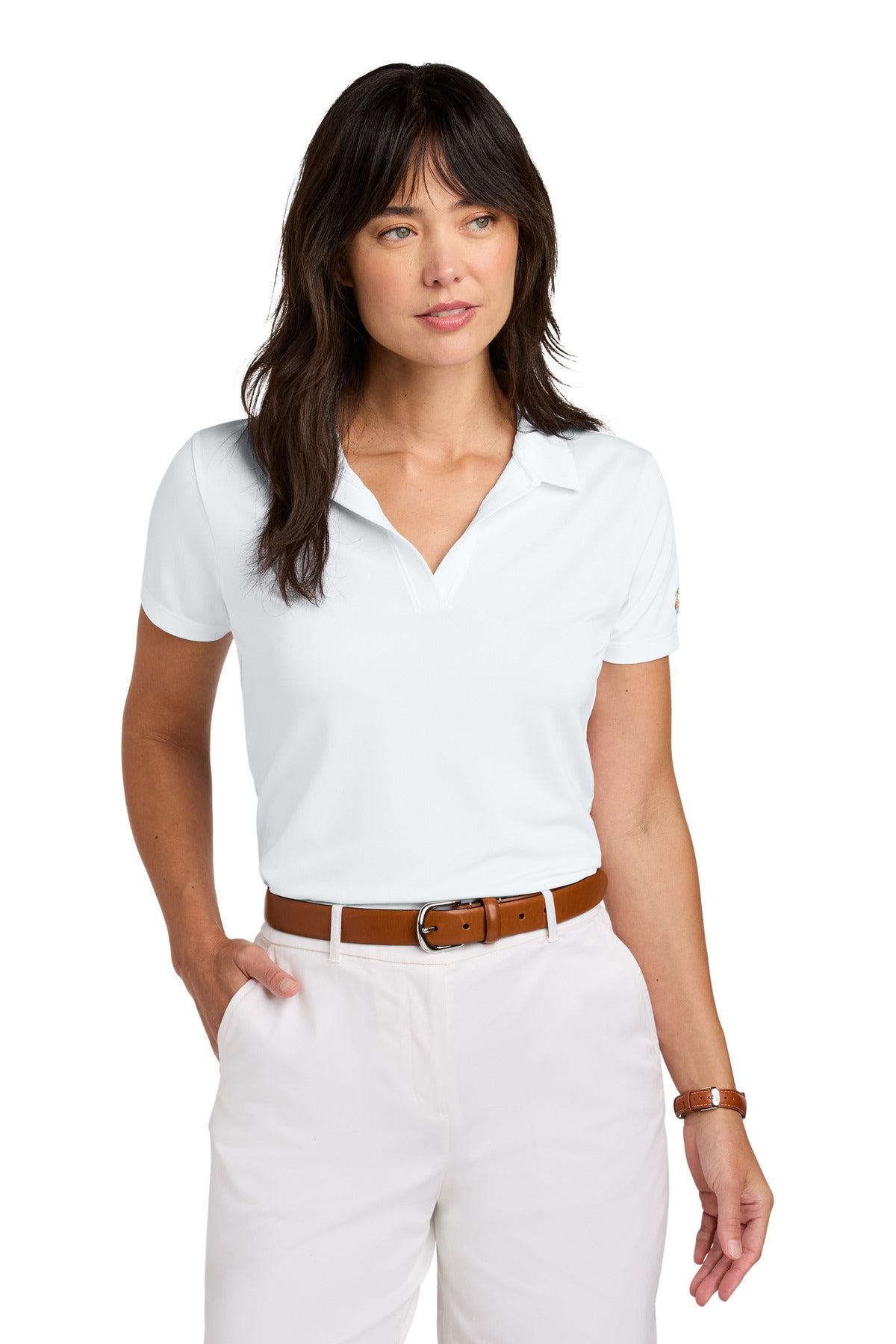 White Brooks Brothers women's mesh pique performance polo shirt worn by a model, front view, showcasing the classic polo design.