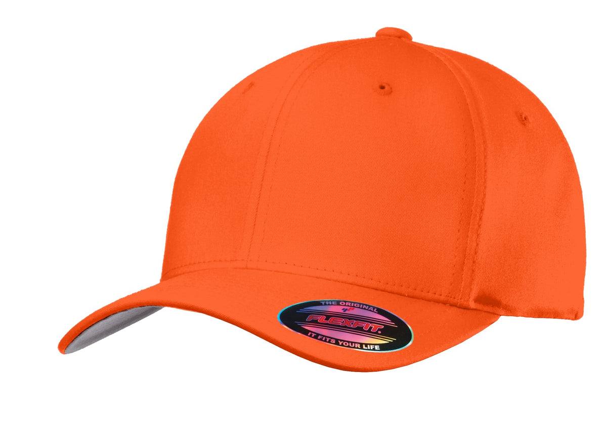 Port Authority Flexfit cotton twill cap in bright orange, flat front style, showcasing its classic design and comfortable fit.