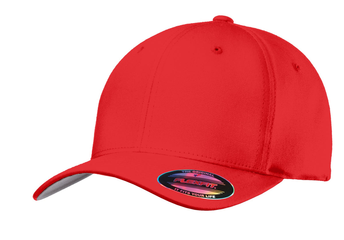 Port Authority Flexfit cotton twill cap in true red with a flat front, showcasing a classic and comfortable baseball style.