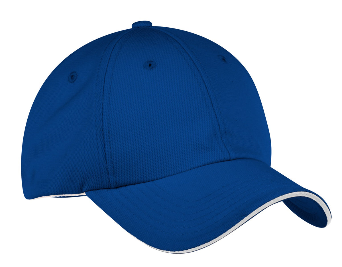 Port Authority Dry Zone cap in royal blue and white, front view showing adjustable closure and breathable fabric.