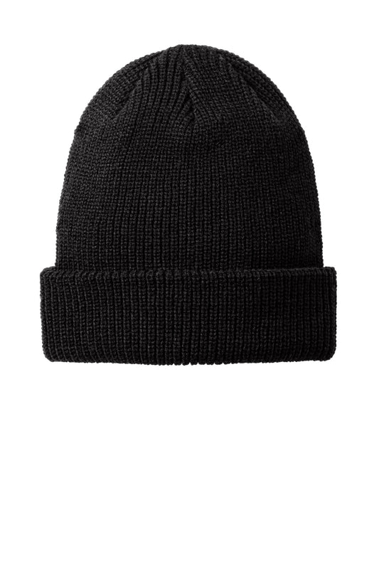 Deep black Port Authority chunky knit beanie, flat front view showcasing soft, textured knit fabric and snug fit.