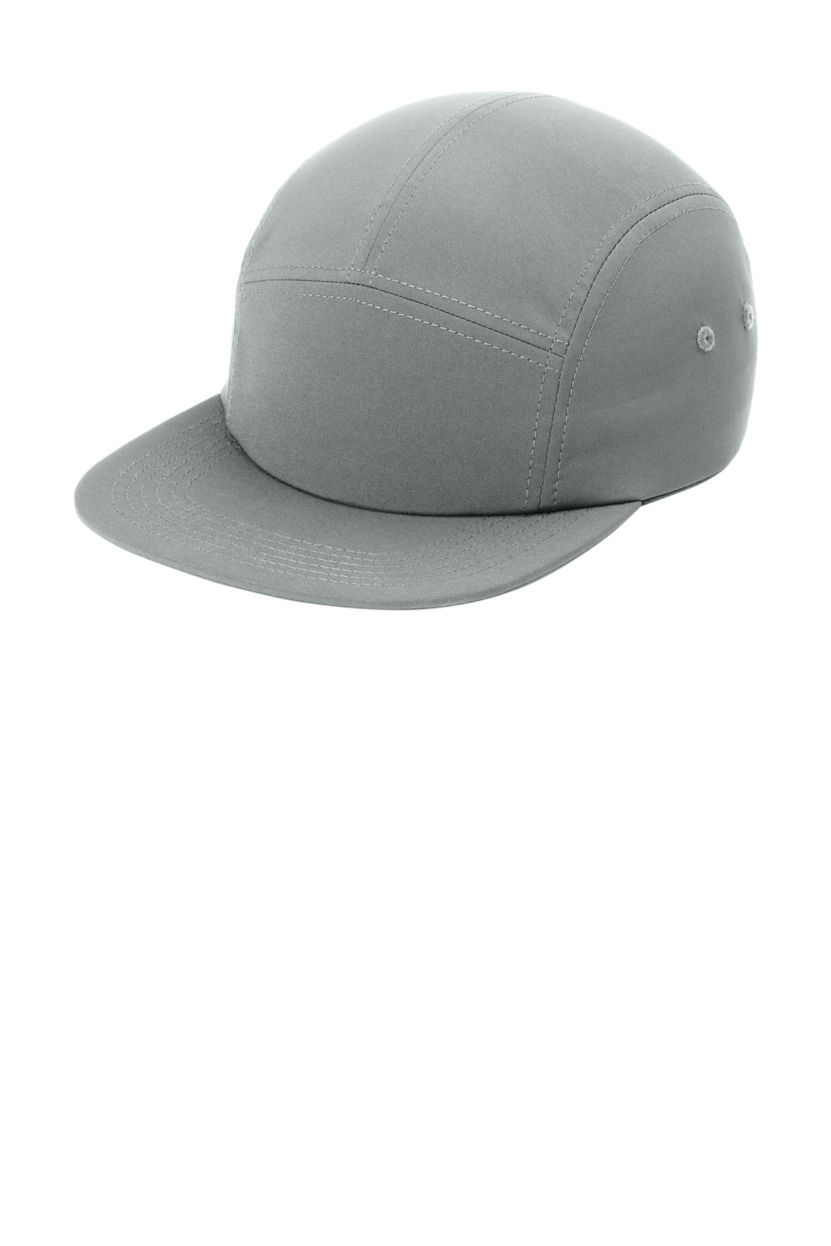Port Authority poly camper cap in deep smoke color, showing the front view with adjustable strap and breathable fabric.