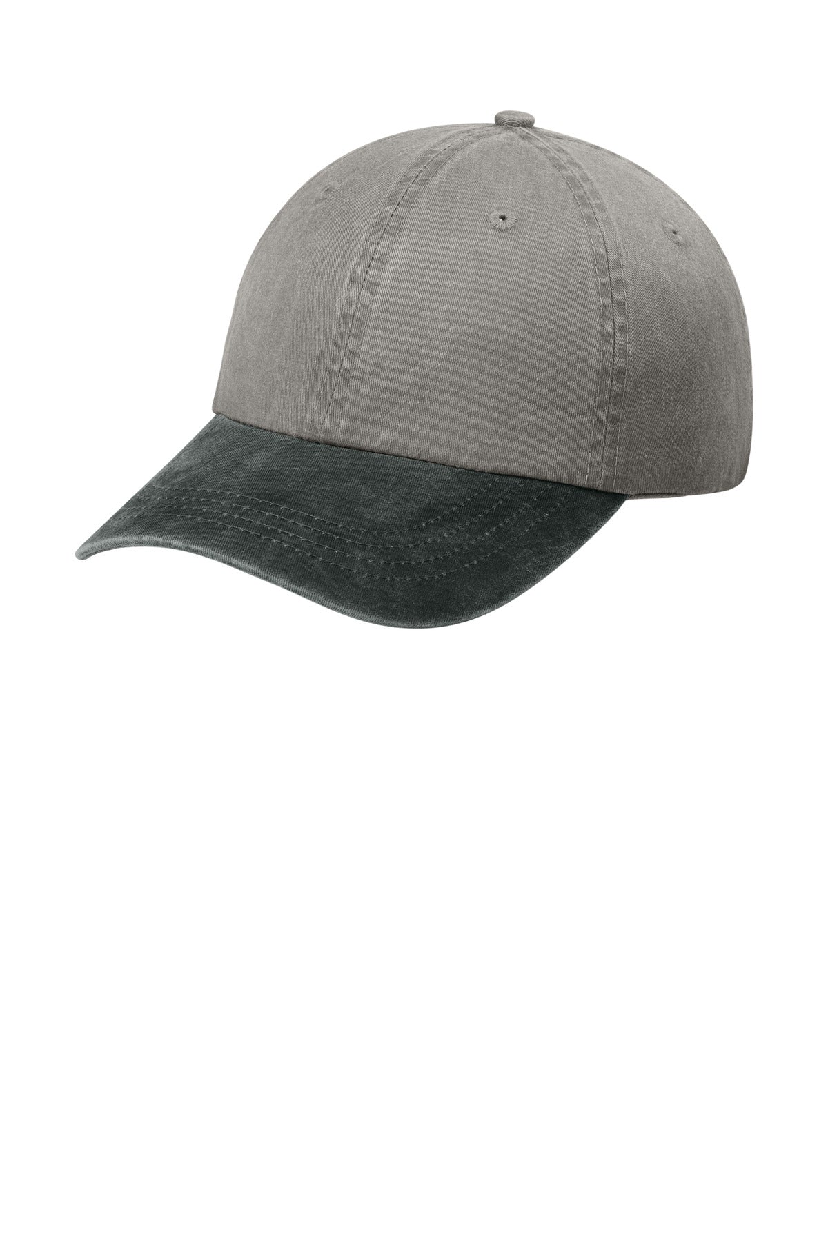 Port Authority two-tone pigment-dyed cap in pebble black, shown from the left side with a curved brim and adjustable strap.