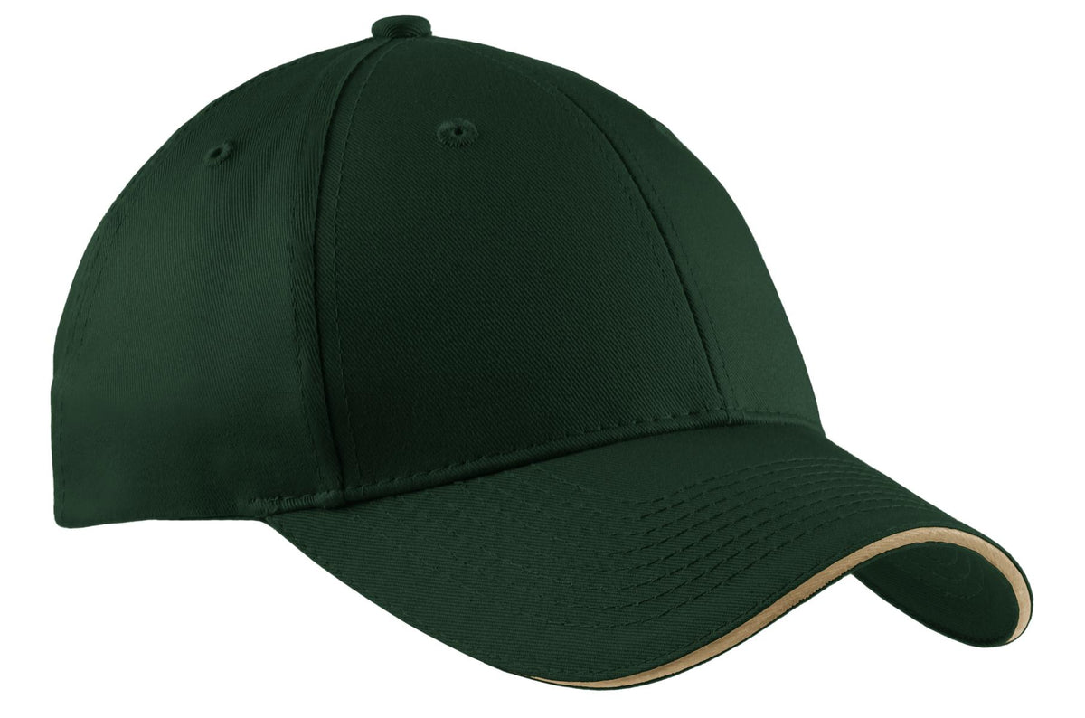 Port Authority cotton twill sandwich bill cap in hunter green with flat front and adjustable strap.