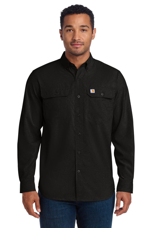 Black Carhartt Force solid long sleeve shirt worn by a model, front view showcasing durable workwear design.
