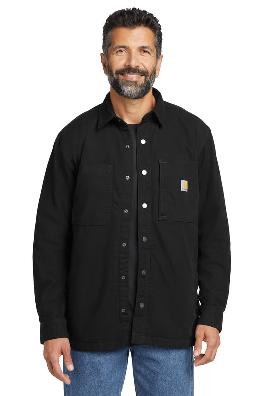 Black Carhartt Rugged Flex fleece-lined shirt jacket with front pockets and button closure, worn by a model.