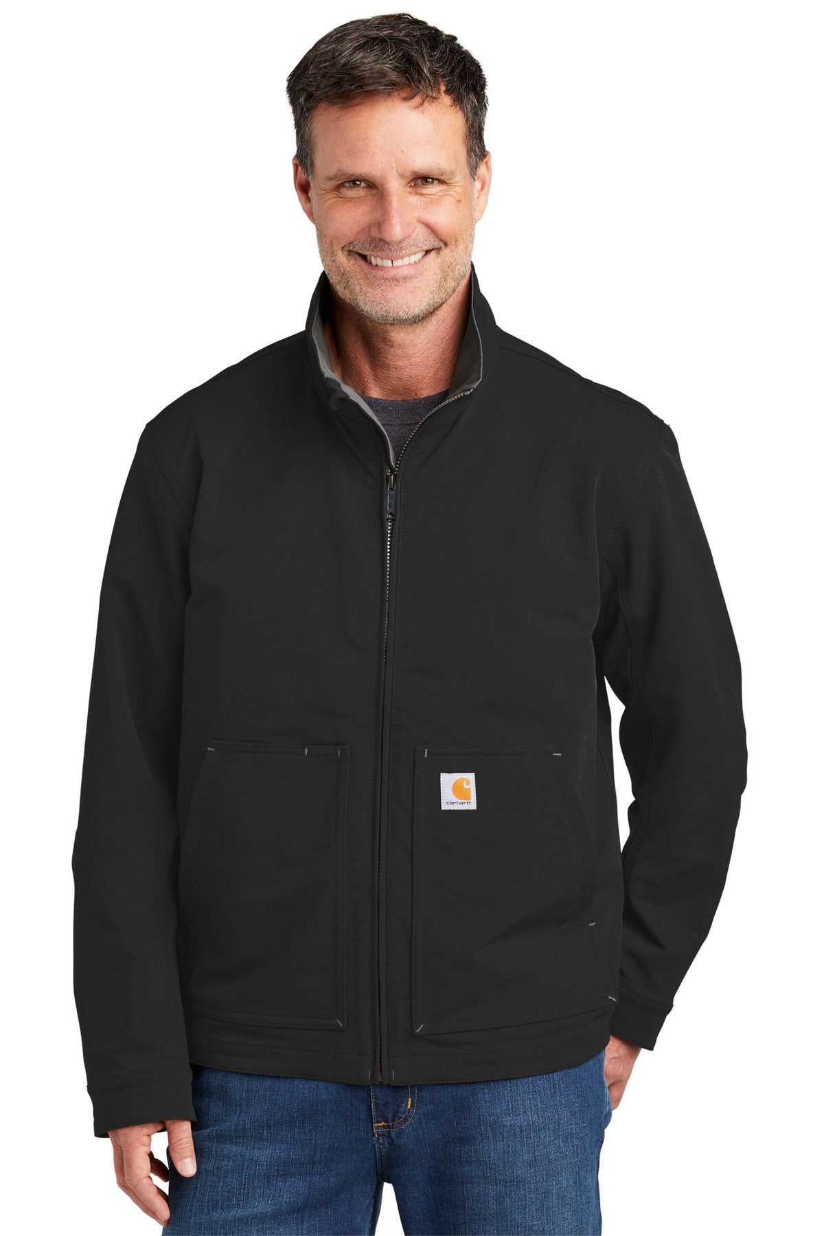 Black Carhartt Super Dux soft shell jacket worn by a model, front view showing durable, water-resistant outer fabric and adjustable hood.