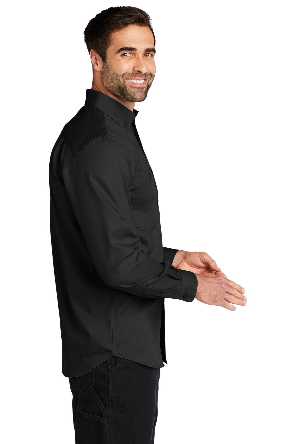 Black Carhartt Rugged Professional Series long sleeve work shirt worn by a model, side view showing durable fabric and design details.