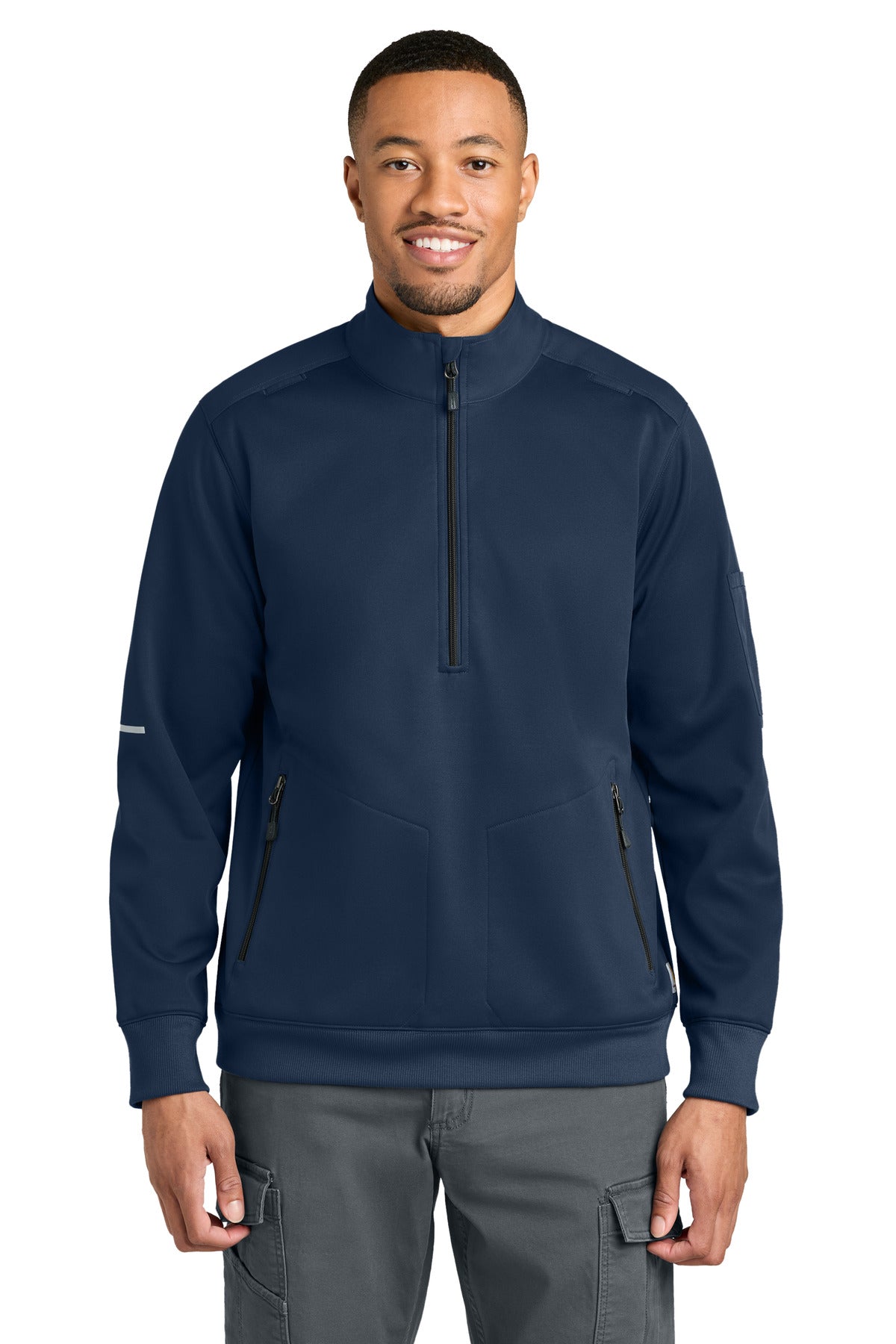 Carhartt dark navy 1/2-zip mid-layer sweatshirt with front zipper and logo detail, worn by a model facing forward.