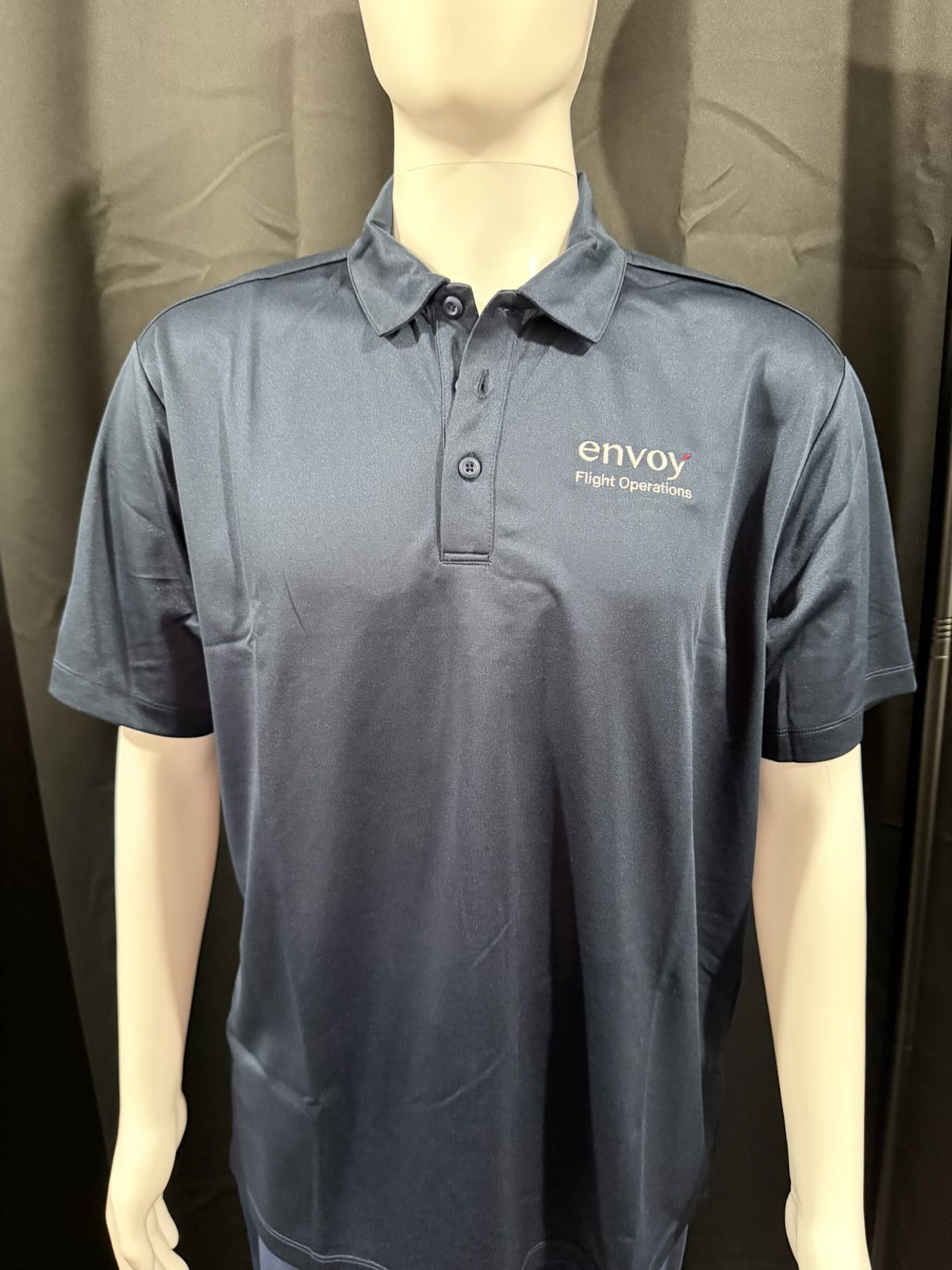 Unisex Envoy New Hire Bundle from Angelheart Embroidery and Screen Printing, featuring a professional fitted shirt.