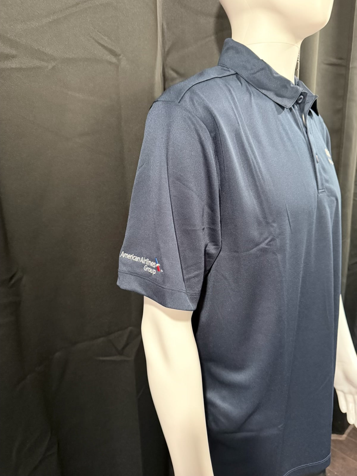 Unisex Envoy New Hire Bundle from Angelheart Embroidery and Screen Printing, featuring branded apparel laid out on a flat surface.