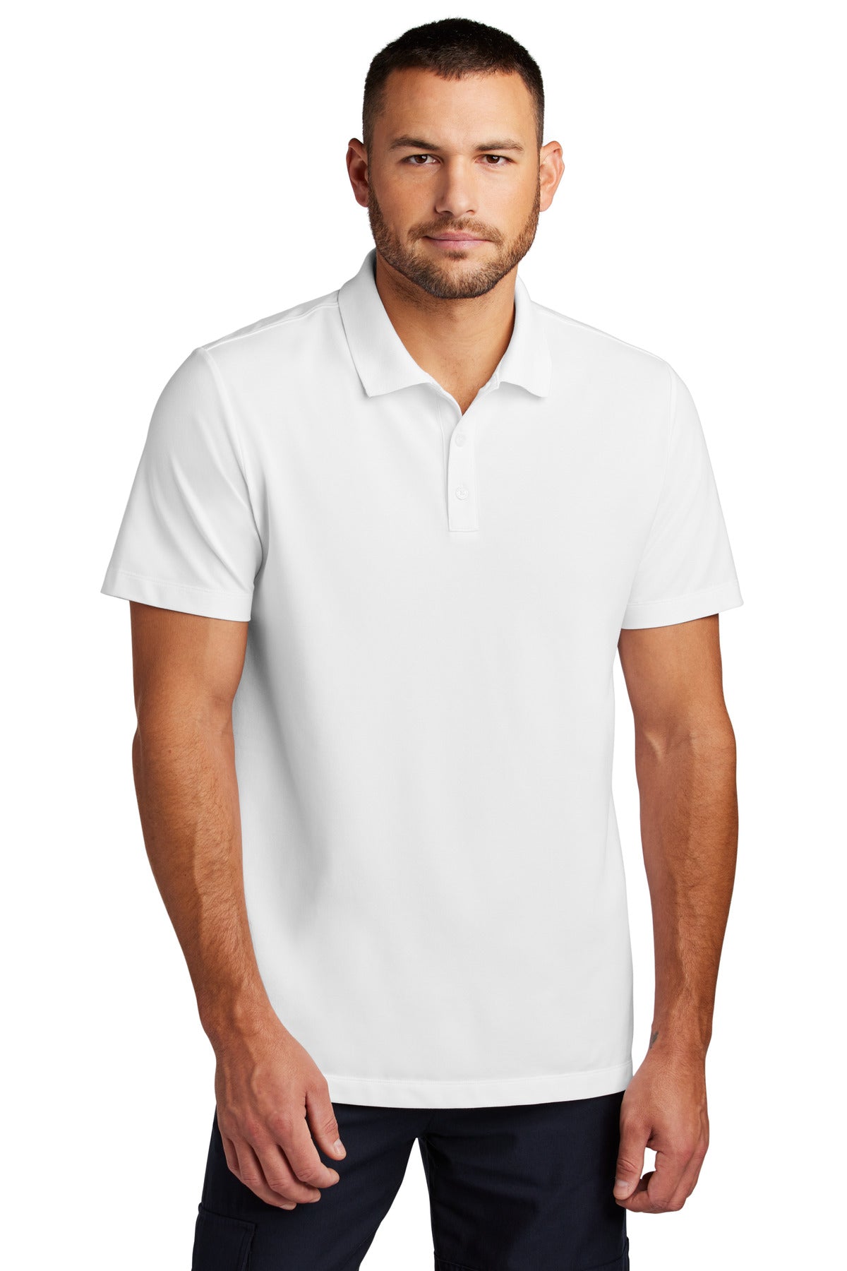 White Mercer+Mettle Stretch Pique Polo MM1004 worn by a model, showing the front view of the men's casual polo shirt.