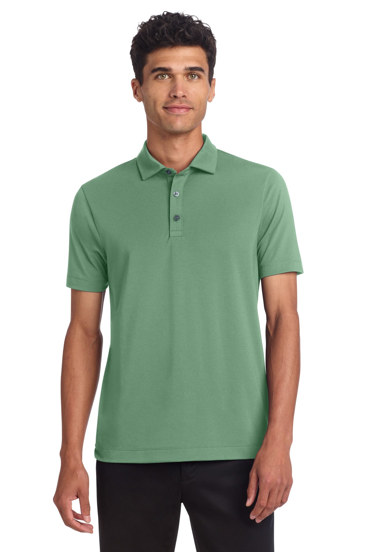 Mercer+Mettle stretch jersey polo shirt in sage color, front view on male model, casual fit, short sleeves, and classic collar.
