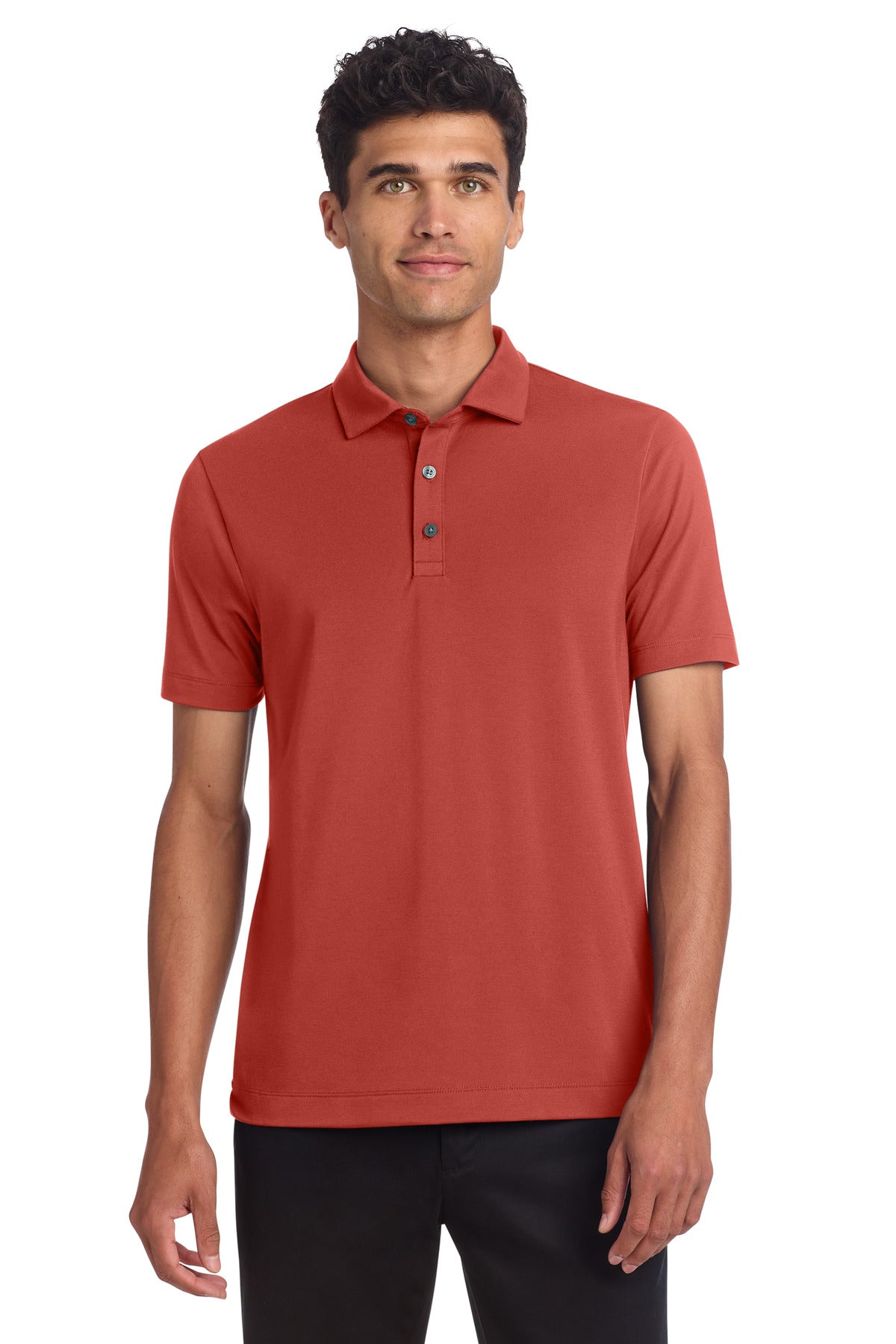 Mercer+Mettle stretch jersey polo shirt in terracotta color, front view on a model showcasing the casual fit and fabric texture.