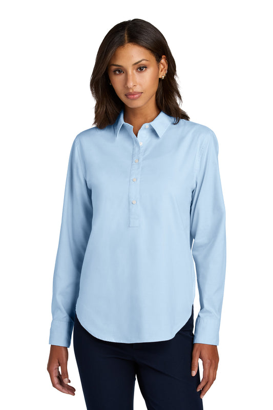Light blue Mercer+Mettle women's long sleeve Modern Oxford shirt front view on model. Classic button-down design.