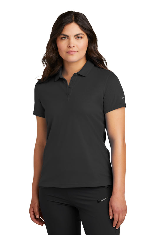 Nike Women's Victory Solid Polo in black, front view showing classic collar and sleek fit, perfect for athletic or casual wear.