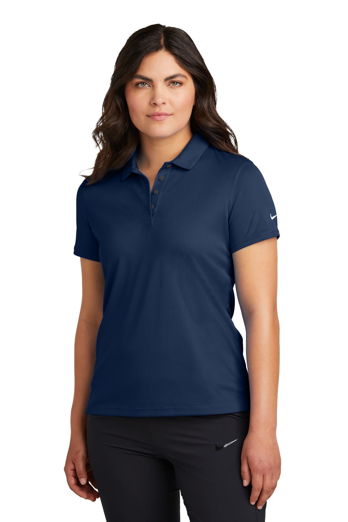 Nike Women's Victory Solid Polo in navy, front view showing classic collar and fit, made from breathable fabric.