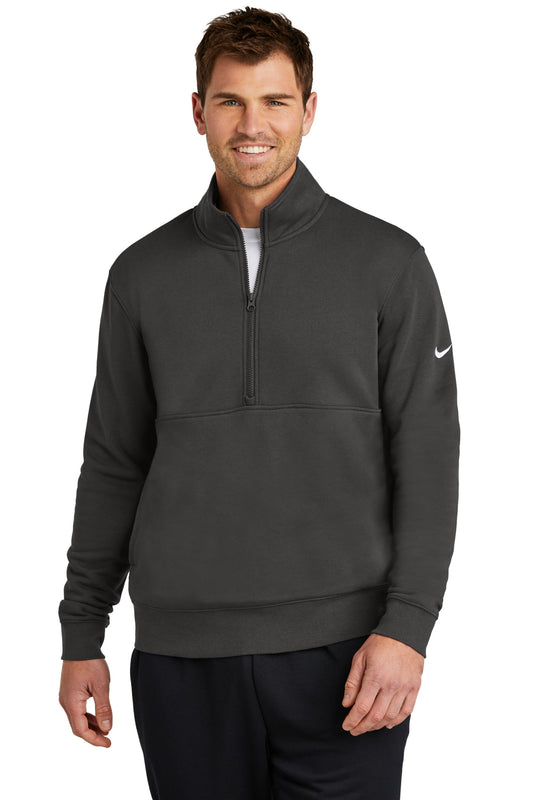 Nike Club Fleece half-zip jacket with Swoosh logo in anthracite, front view showing the cozy fleece fabric and sporty design.