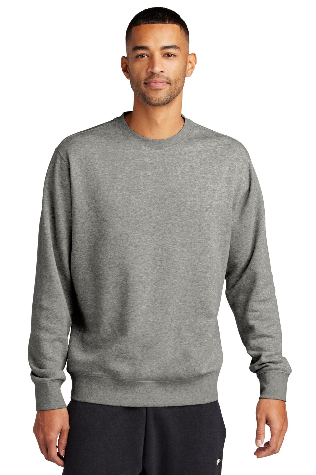 Nike Club Fleece Swoosh Crew sweatshirt in dark grey heather, front view showing the Nike Swoosh logo on the sleeve.